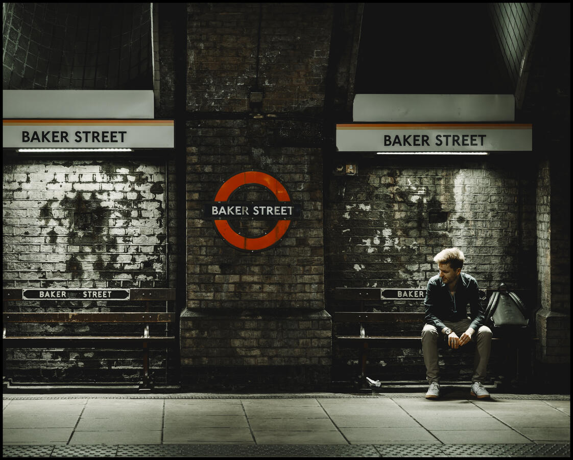 Baker Street Photo of a man waiting for his tube at Baker Street Station, London